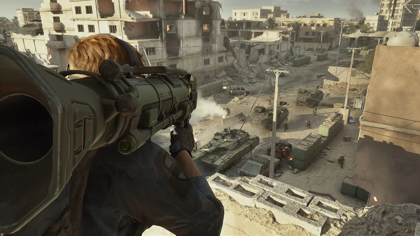 A Delta Force operator firing a rocket launcher over a city while tanks advance below